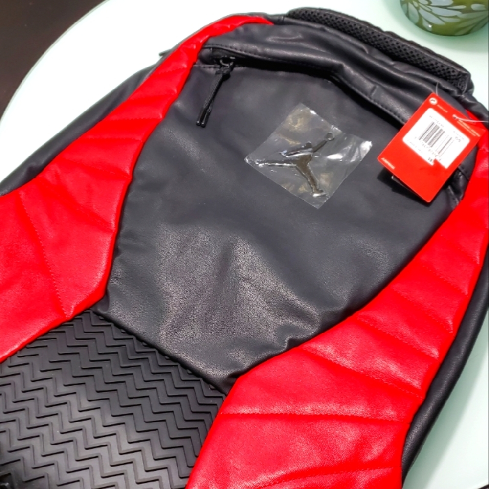 (SOLD) JORDAN

RETRO 12 BACKPACK